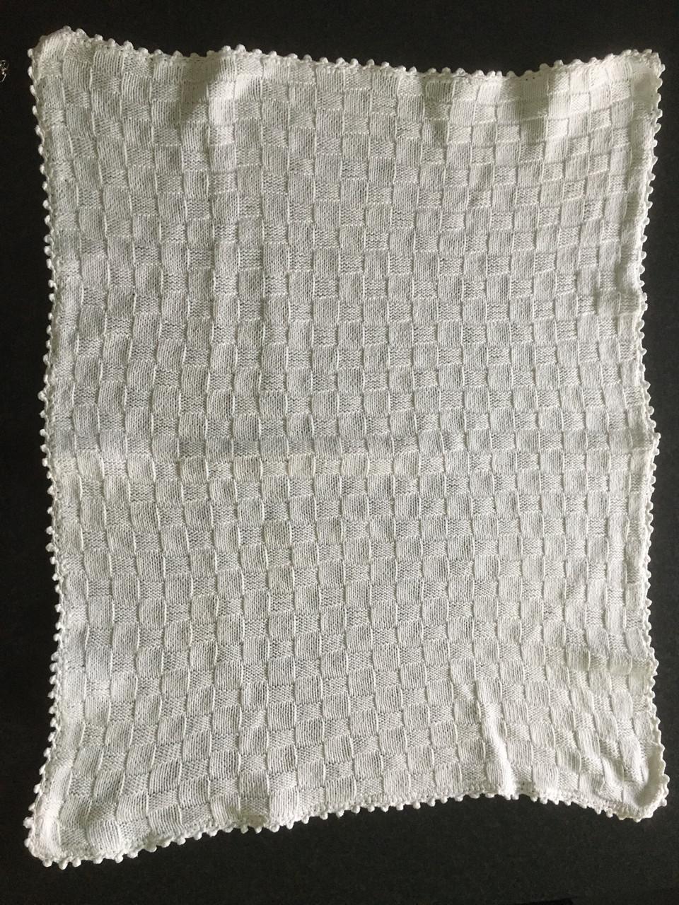 Matrasbeschermer  (gebreid) voor wieg of kinderwagen, z.g.a.n!