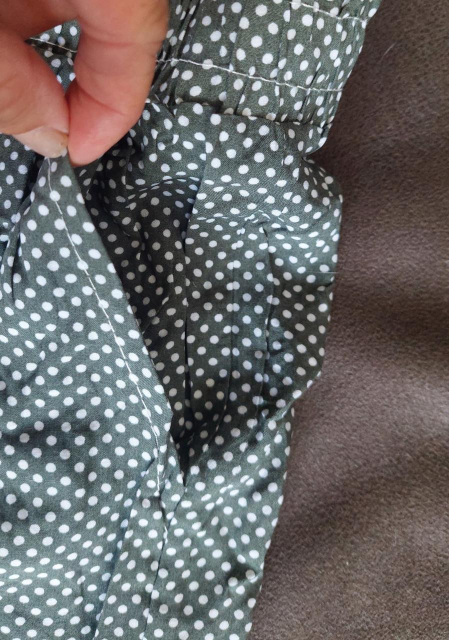 Nieuwe groen/wit gestippelde dames flaredbroek mt M/l