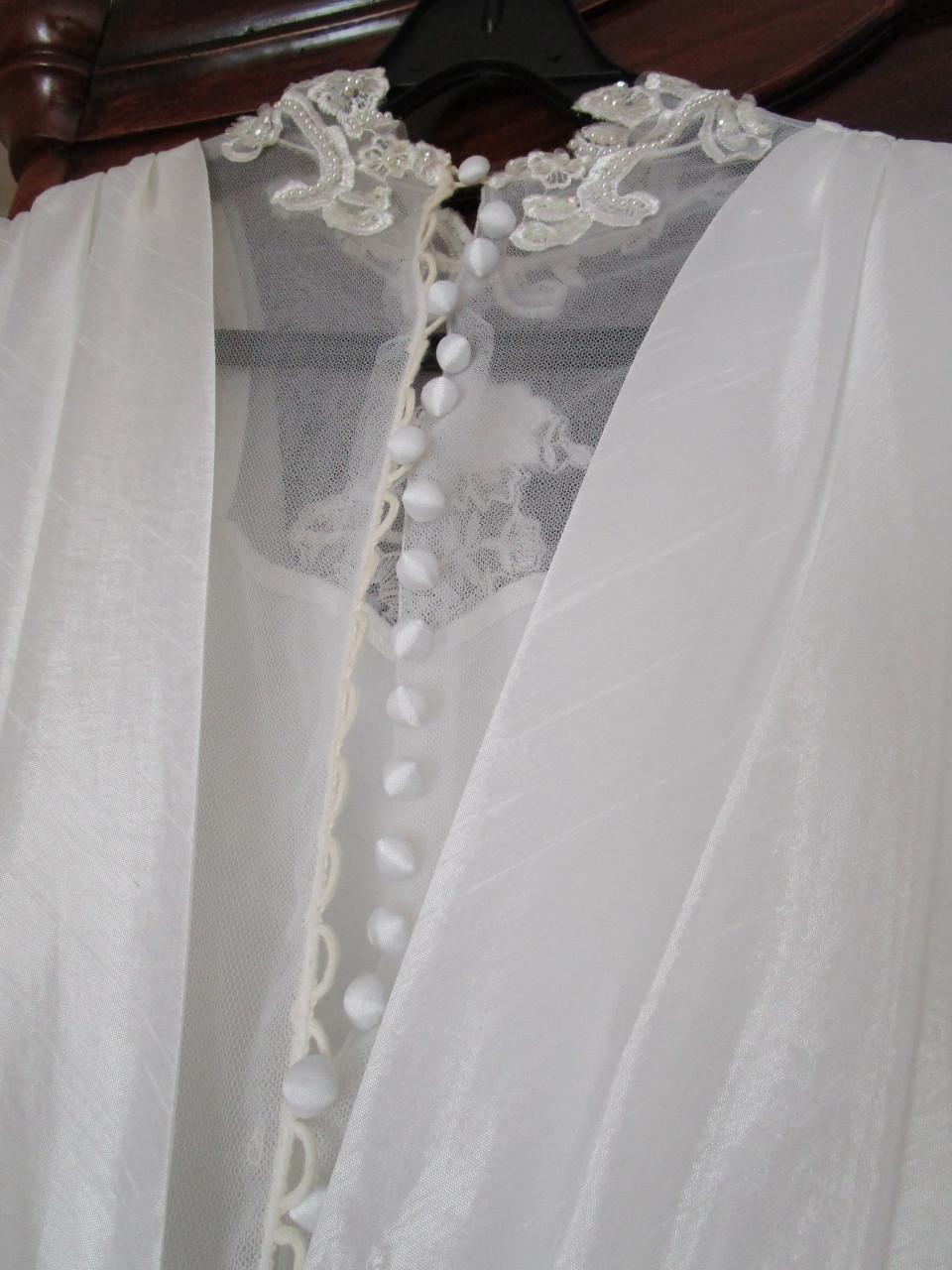 Nagenoeg nieuwe bruidsjurk