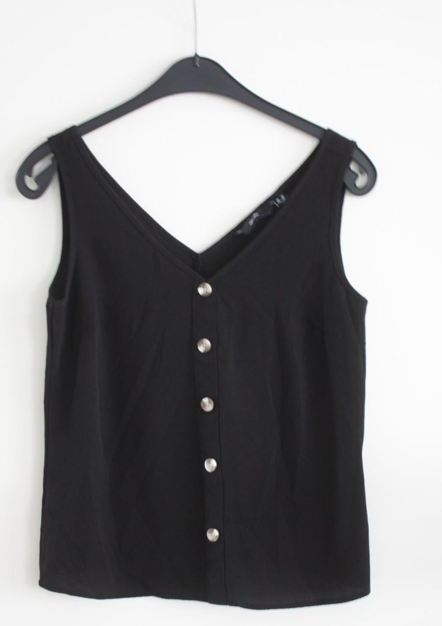 Zwarte top met sierknopen maat xs