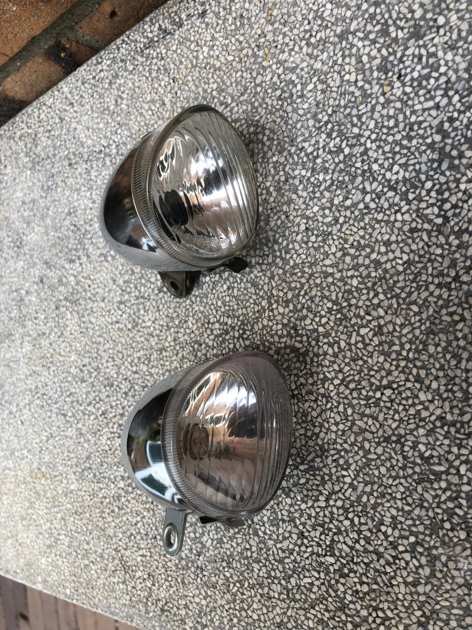 2 vintage koplampen.