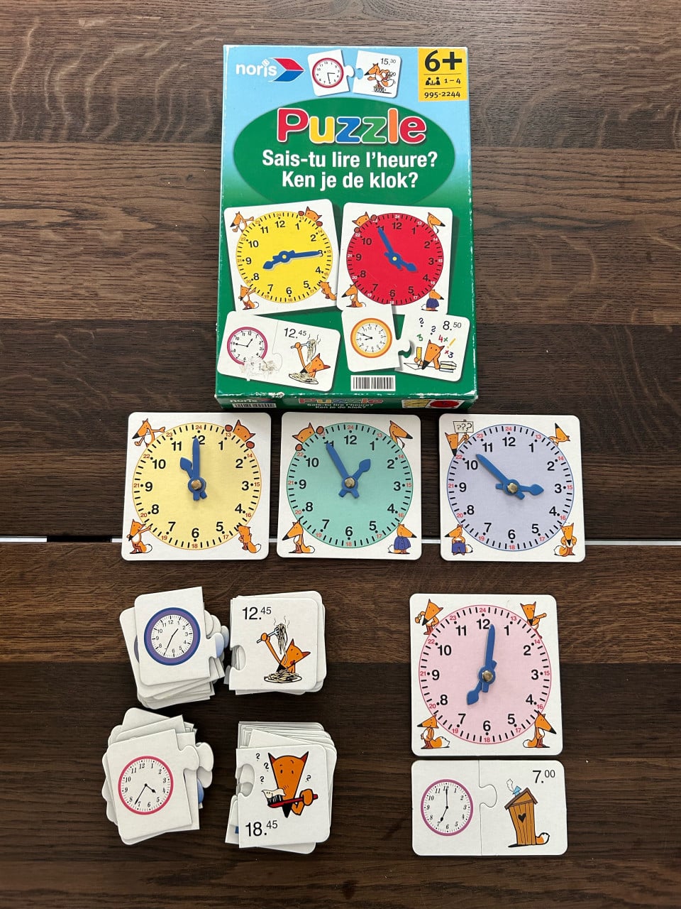 Spel puzzel klok leren lezen