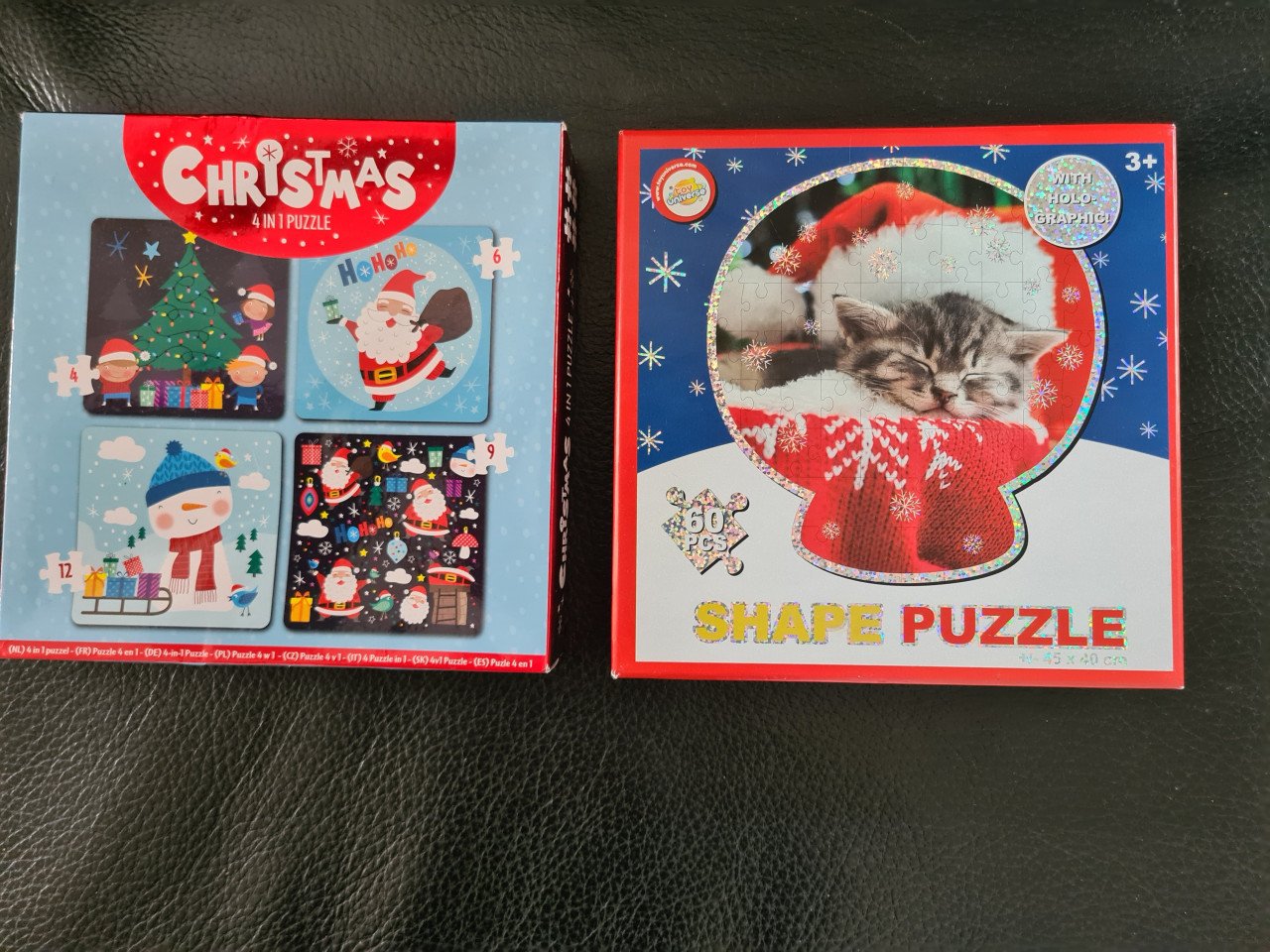 Pakketje : 2 legpuzzels,  1 houten puzzel, leesboekje Samen €3,-