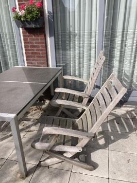 Tuintafel met 4 verstelbare teak houten stoelen