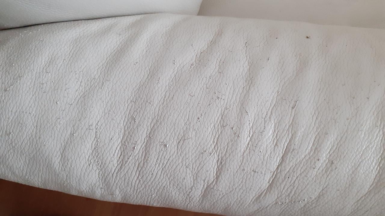 Crème-witte lederen Ergoline tweezitbank en comfortabele Montel fauteuil