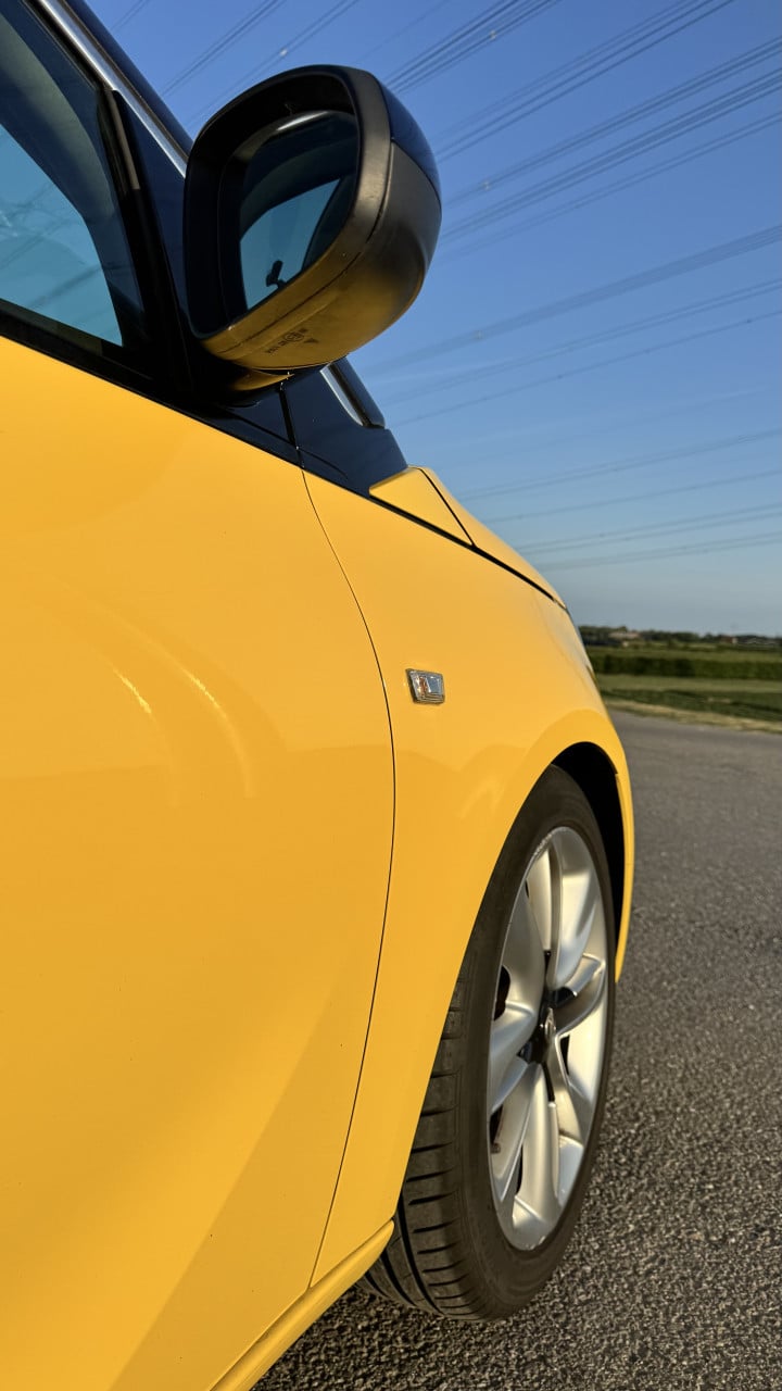 Opel Adam 1.4 | Geel | Cruise Control | Airco | Bluetooth | APK 17-02-2026