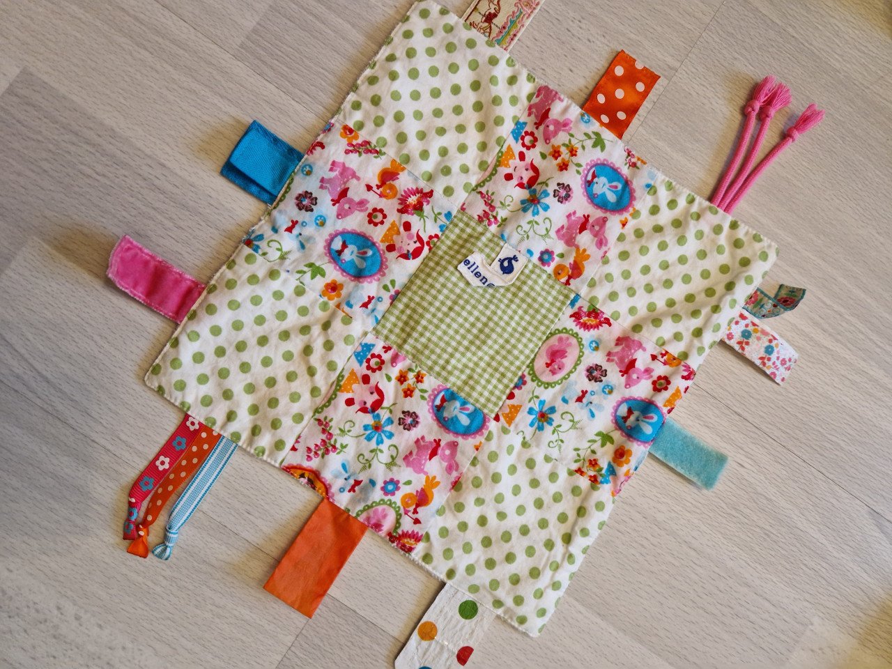 Boxzak met babyspeelgoed