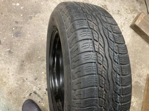 Reserveband thuiskomer ijzeren velg