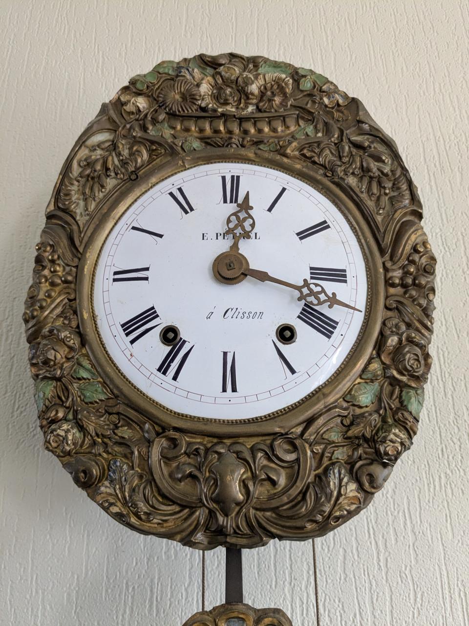 Mooie comtoise klok met bloemslinger