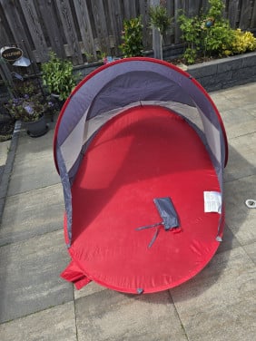 Pop-up strand tent