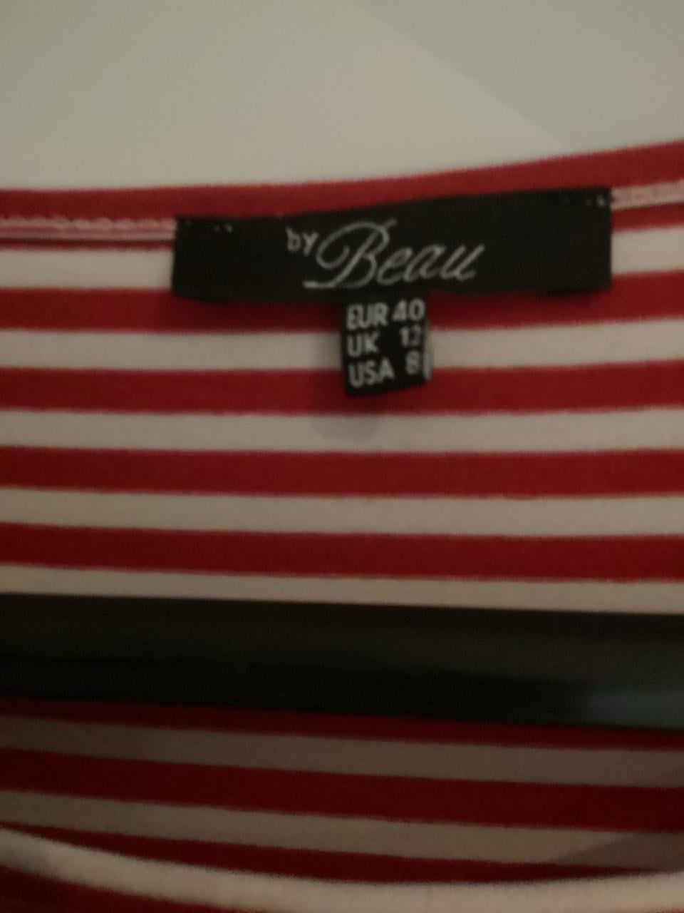 Splinternieuw lang shirt maat 40 valt groot