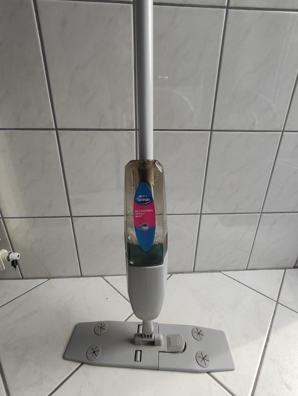 Dweil met sprayfunctie