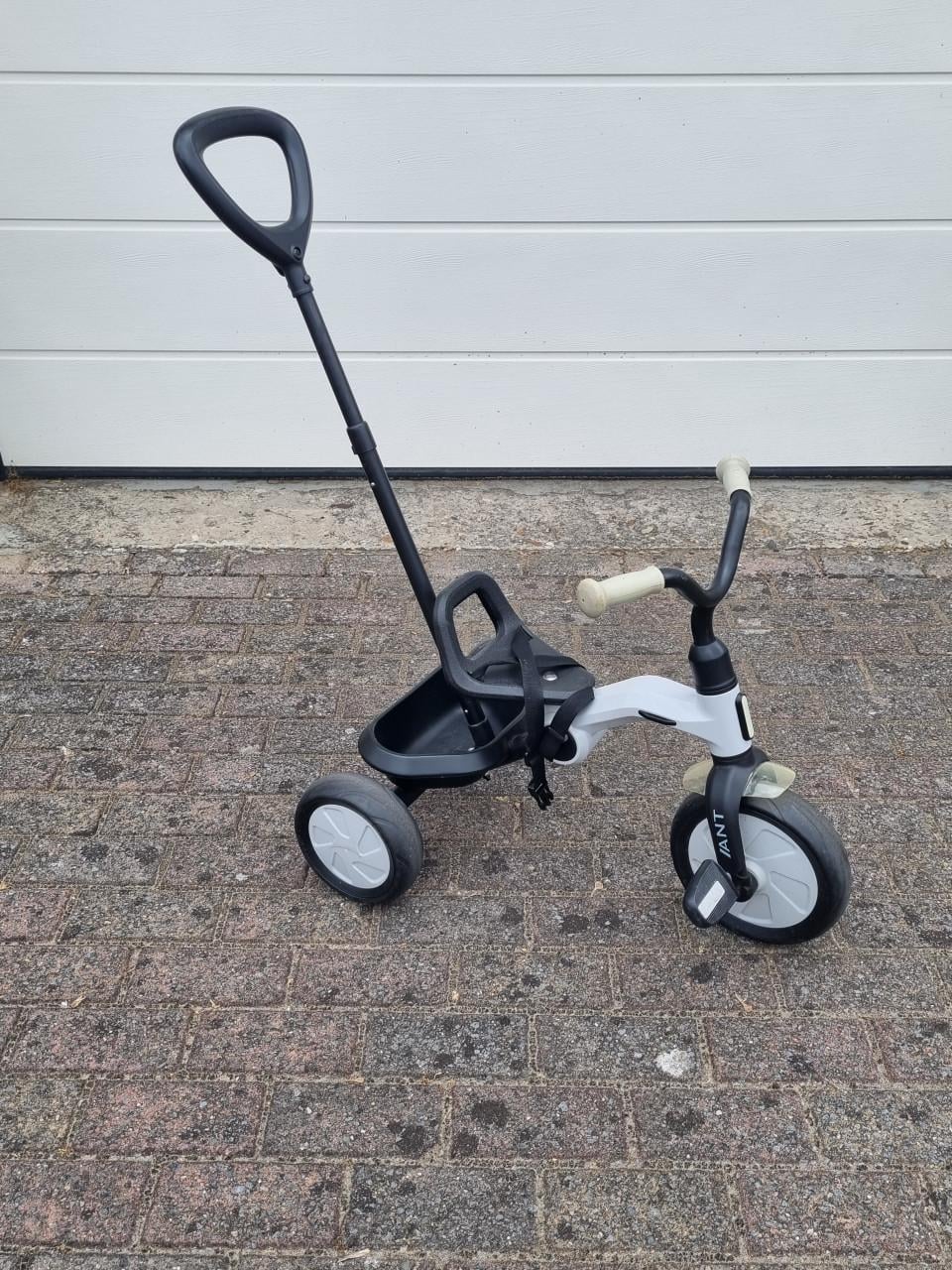 Driewieler met duwstang