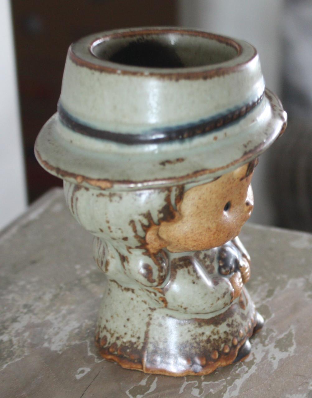 Stenen theelichthouder meisje