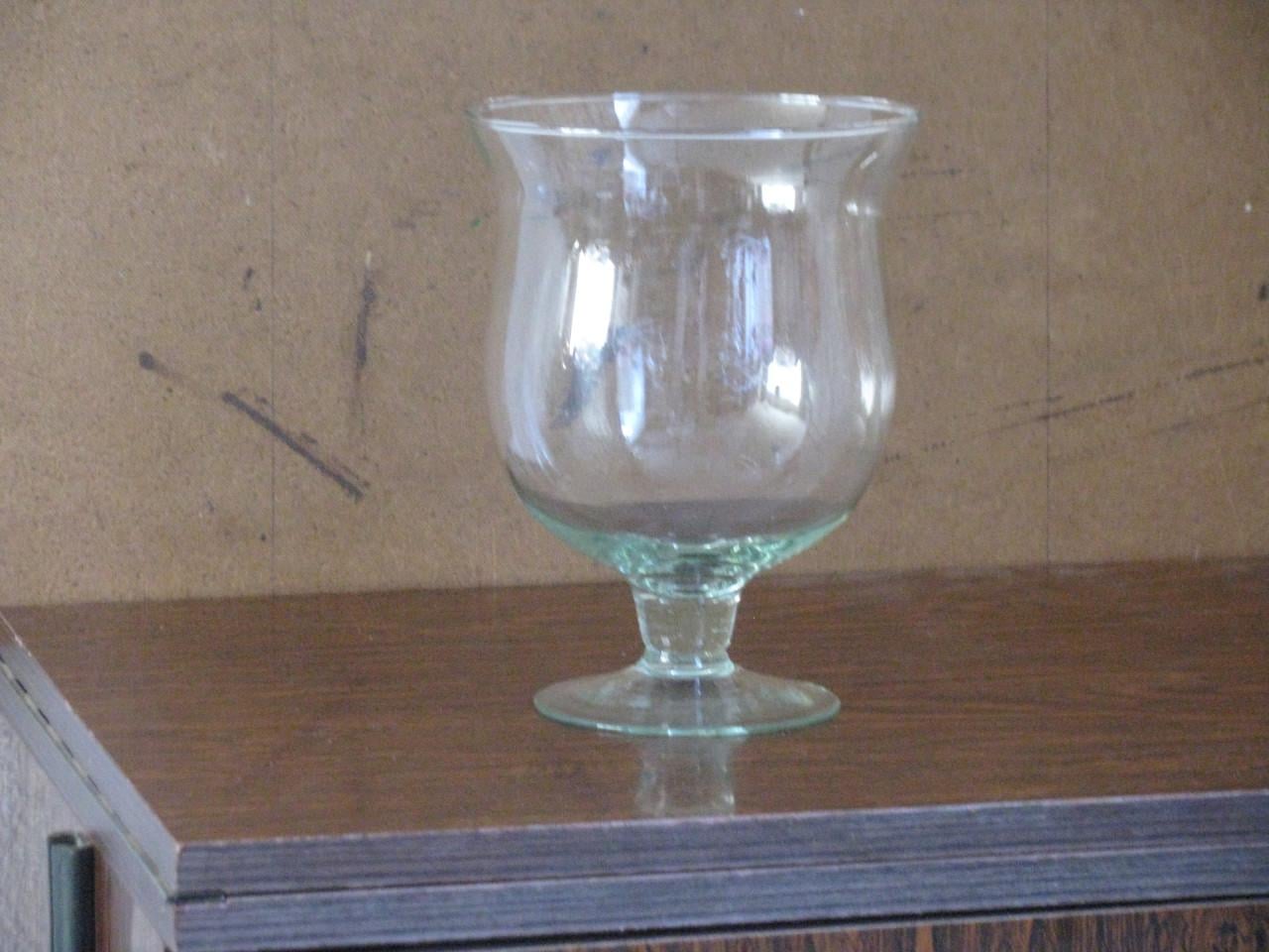 Windlicht en Glazen vaas.