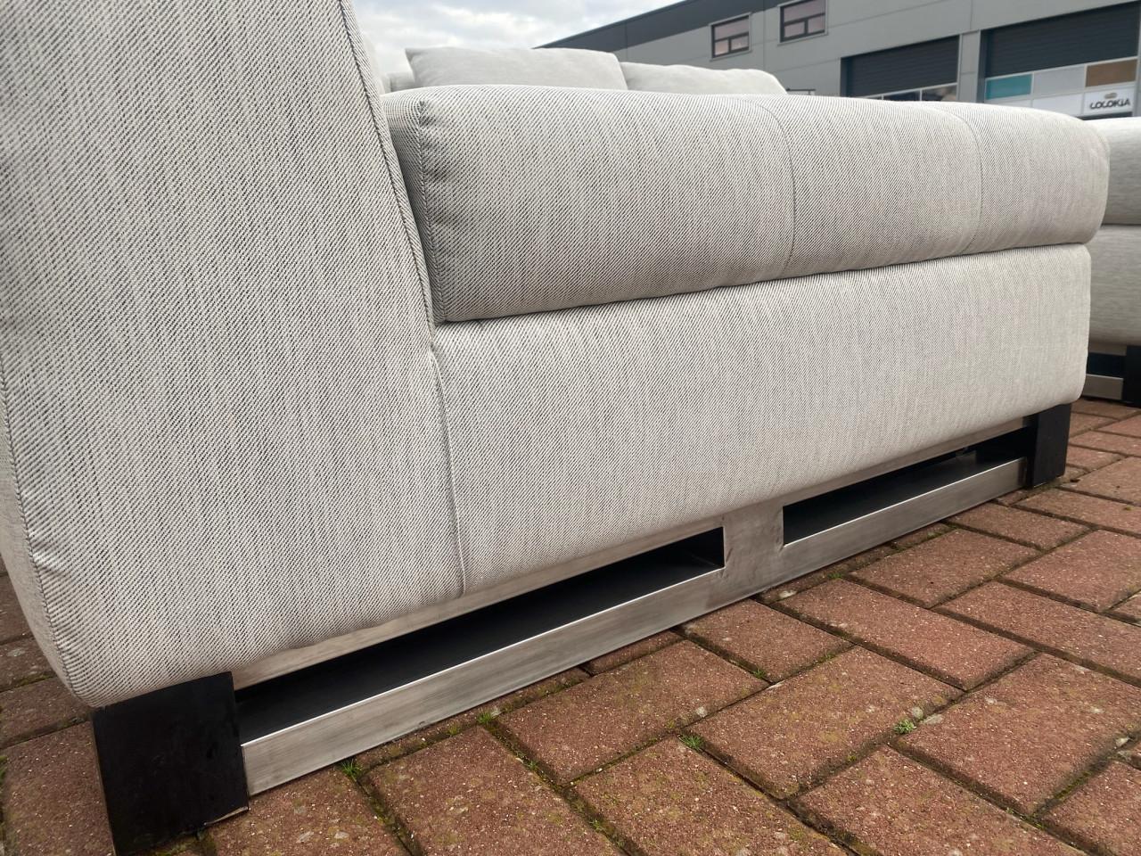 Grijze Stoffen Hoekbank met Hocker – Ruim Loungecomfort–Gratis Levering NL