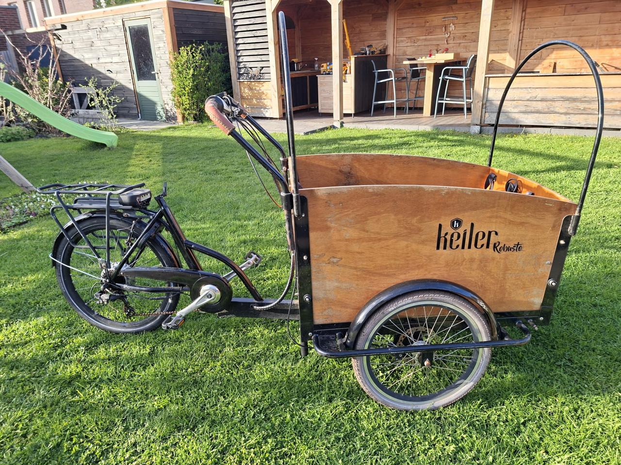 Elektrische bakfiets opknapper.