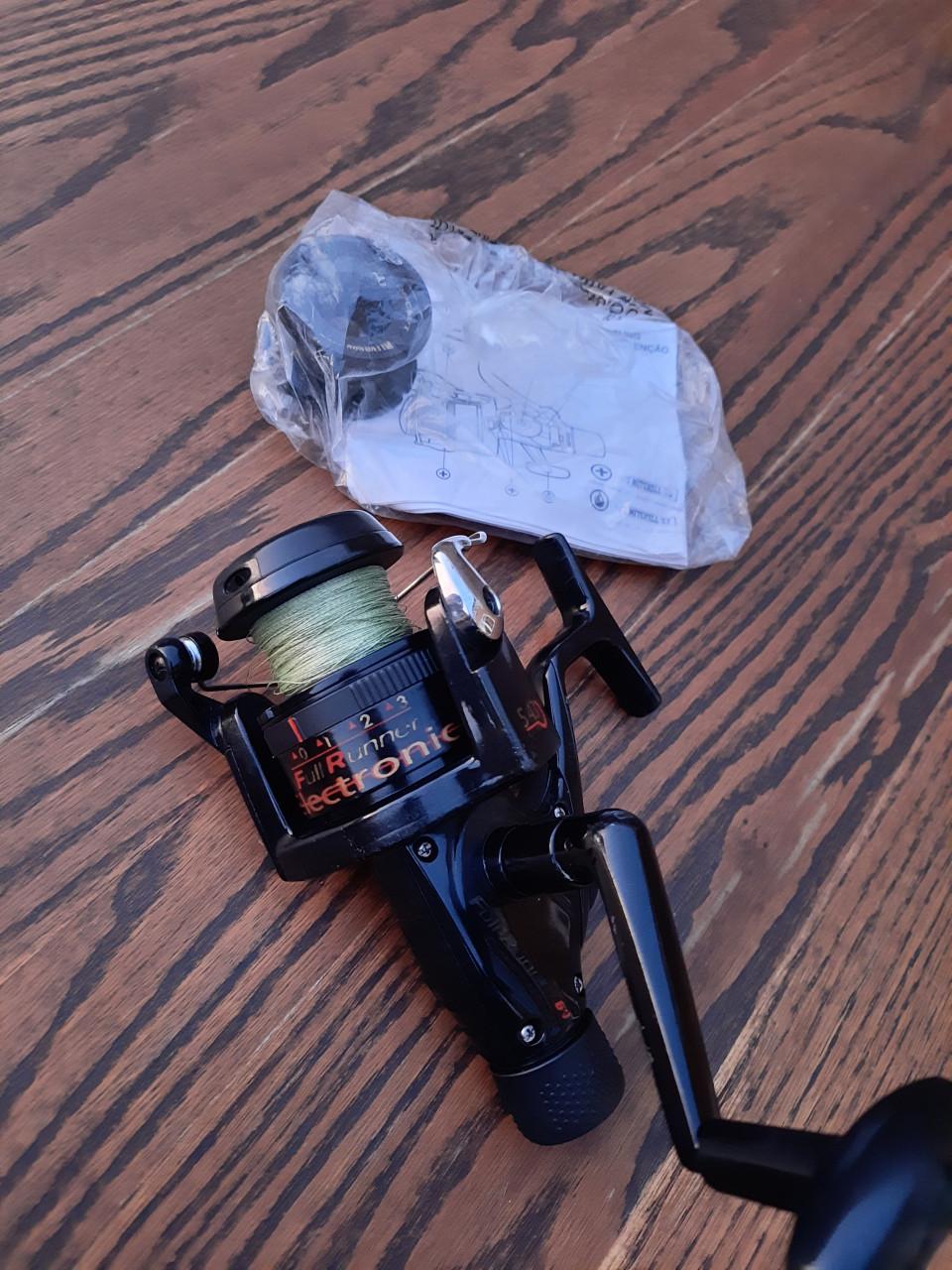 Hengels en molens strandhengel zeehengel boothengel karperhengel vissen