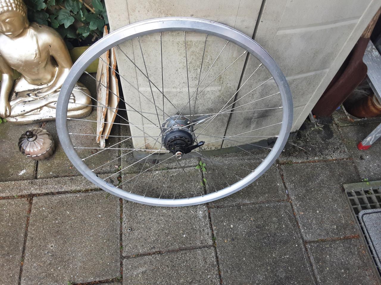 28 inch shimano achterwiel, 7 speed,terugtraprem