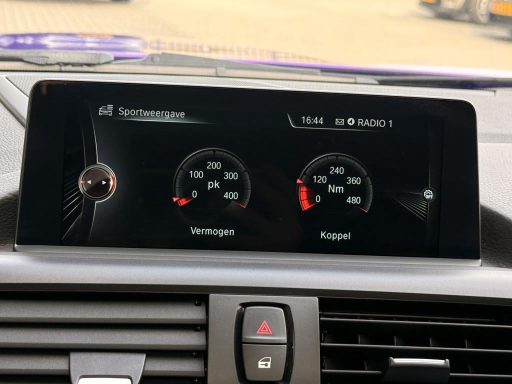 BMW 1 Serie m135i m-performance | schuifdak| navi | cruise | performance ui