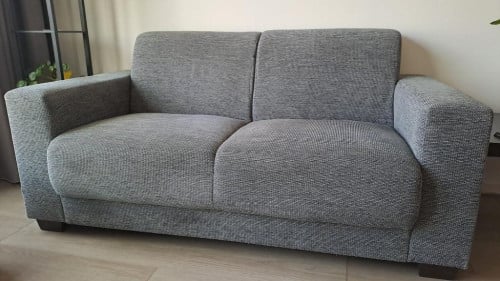 Bijna nieuwe Bank (2,5 zits, stoffen bekleding, grijs) winkelprijs €499,-