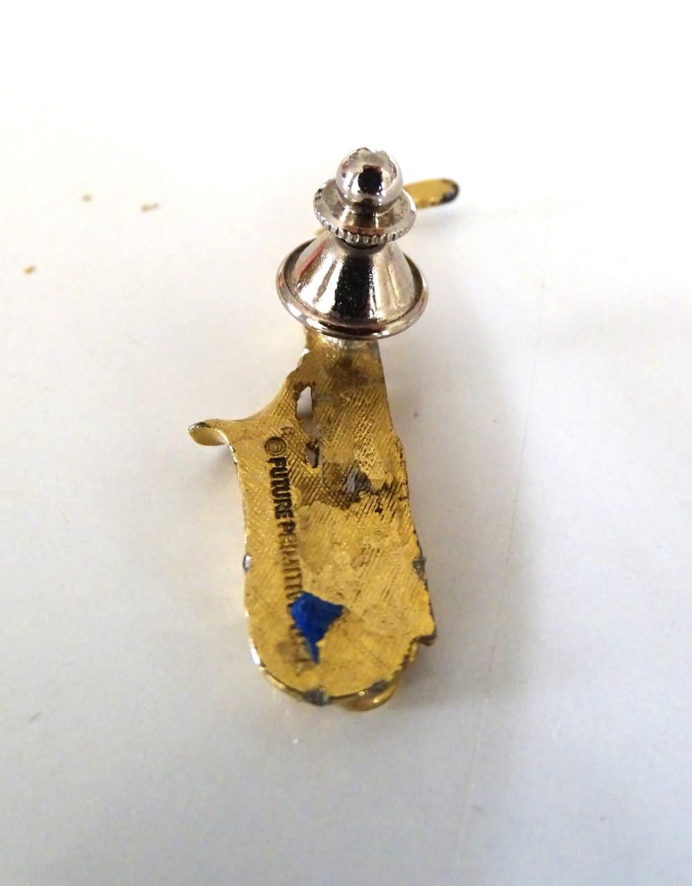 Saxofoon speldjes en manchetknoop