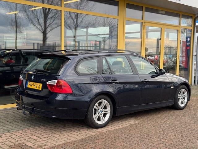 BMW 3-serie touring 318i | pano | trekhaak | xenon | garantie