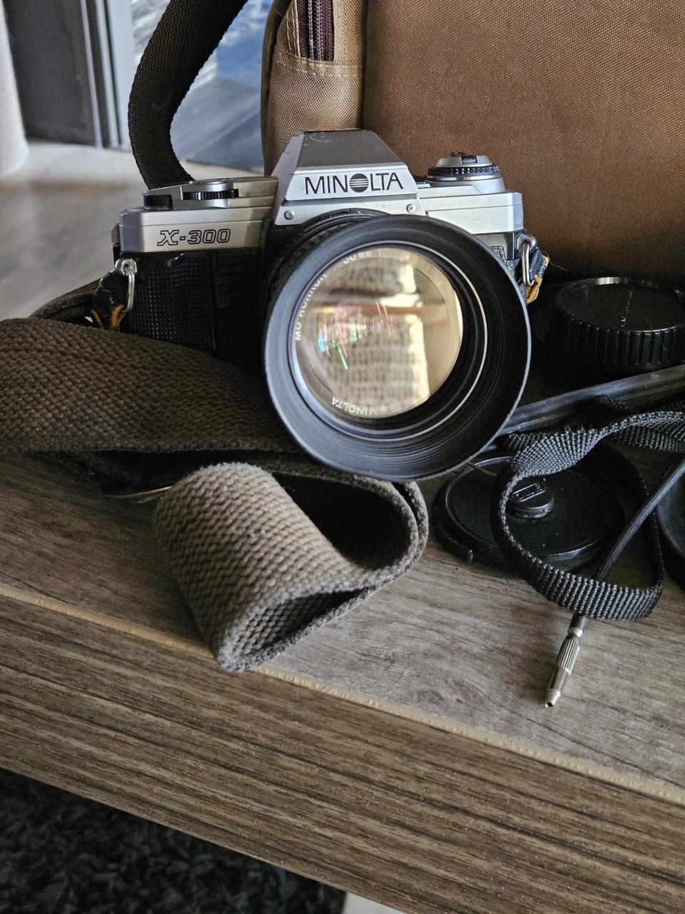 Vintage Minolta spiegelreflex camera X 300 met extra lenzen