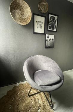 Stijlvolle ronde grijze stoel met zwart onderstel - zo goed als nieuw