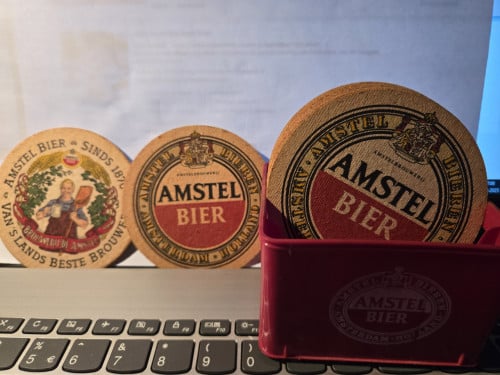 Amstel bierviltjeshouder krat met 11 bierviltjes