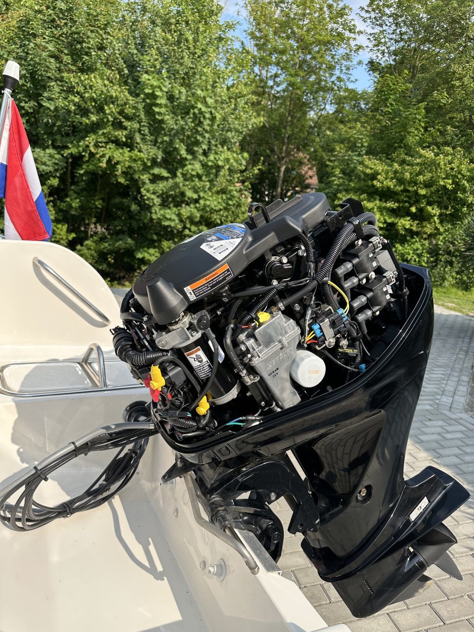 Mooie Elan 15SC met vrijwel nieuwe Mercury 60 pk en Pega trailer
