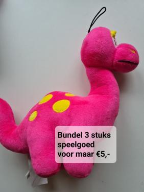 Roze dinosaurus- schoon en gewassen, klaar om te knuffelen.