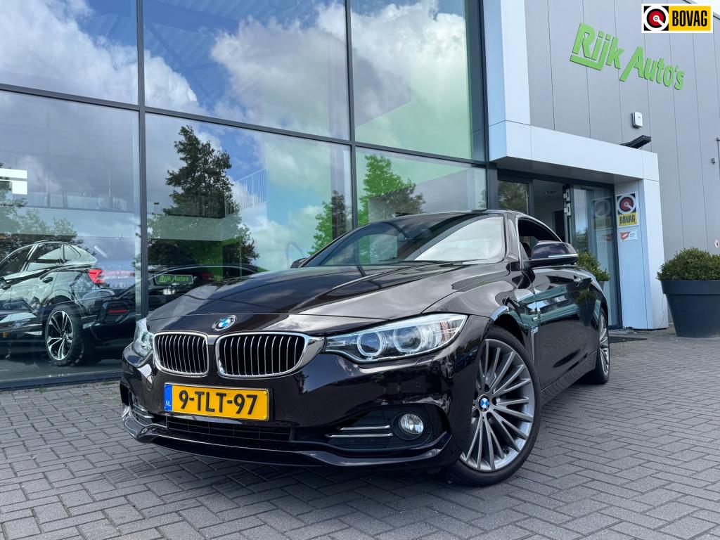 BMW 4 Serie cabrio 428i high executive * nl auto nap * stoel + nek verwarmi