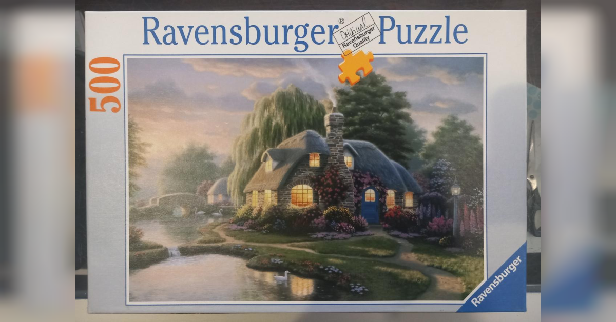 Puzzel Cottage aan een meer