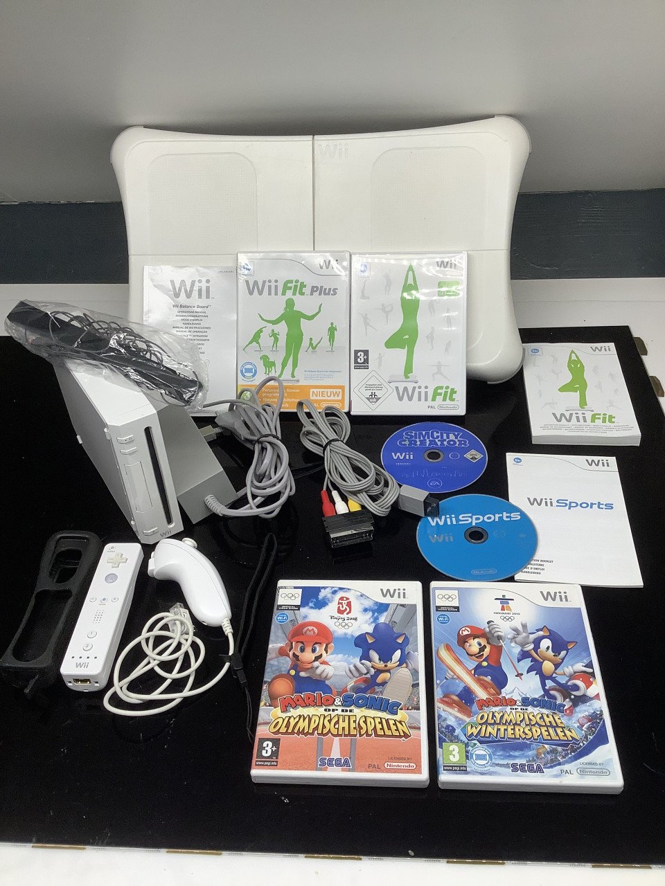 Nintendo Wii compleet, zonder doos met veel spellen.
