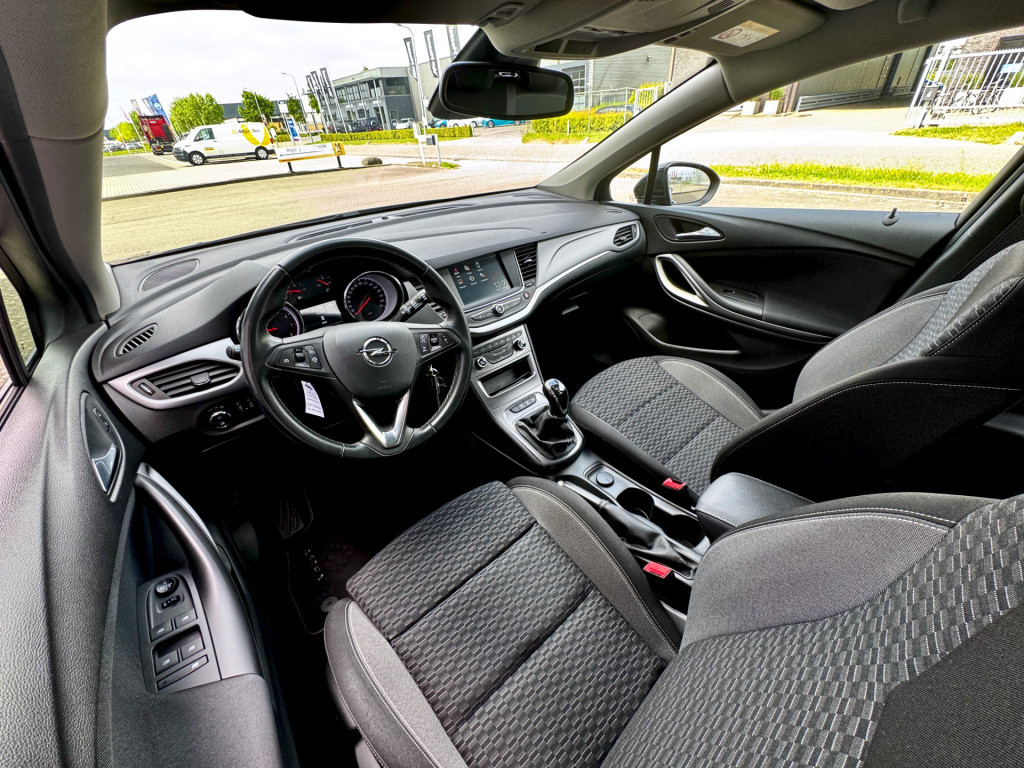 Opel Astra sports tourer 1.2 business edition+ navi ecc cruise