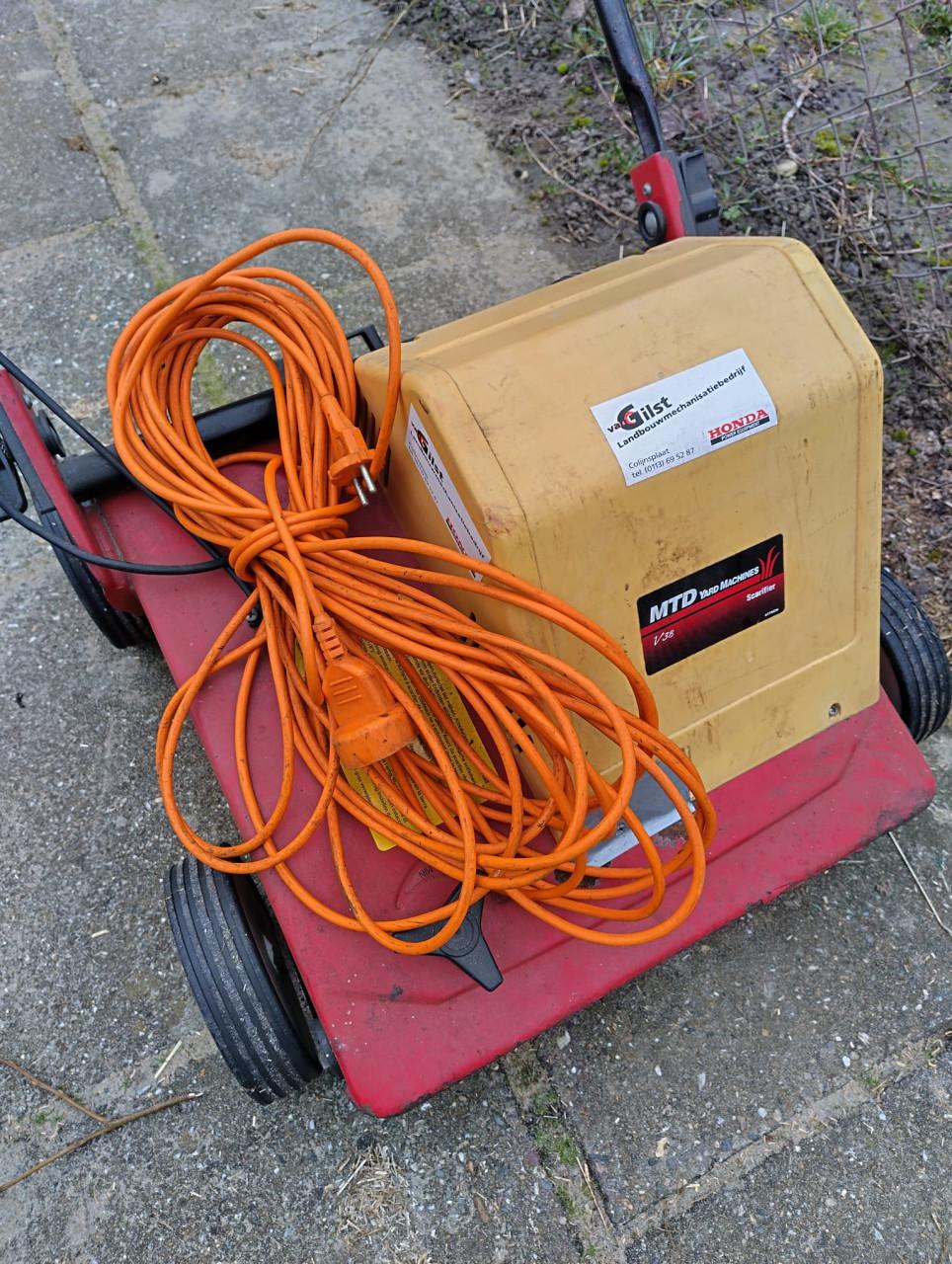 MTD verticuteer machine