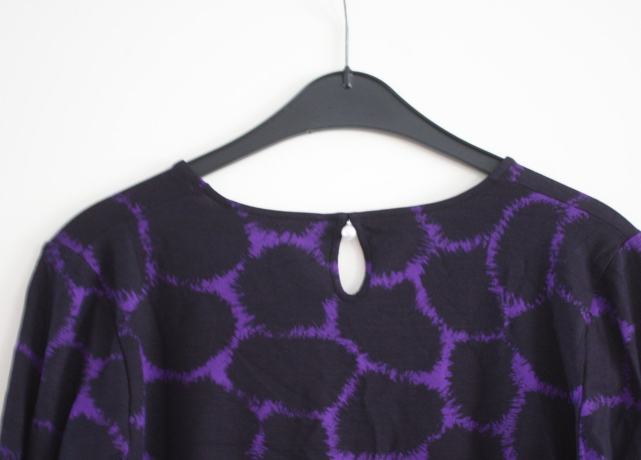 Niieuw shirt met 3/4 mouwen zwart paars maar L