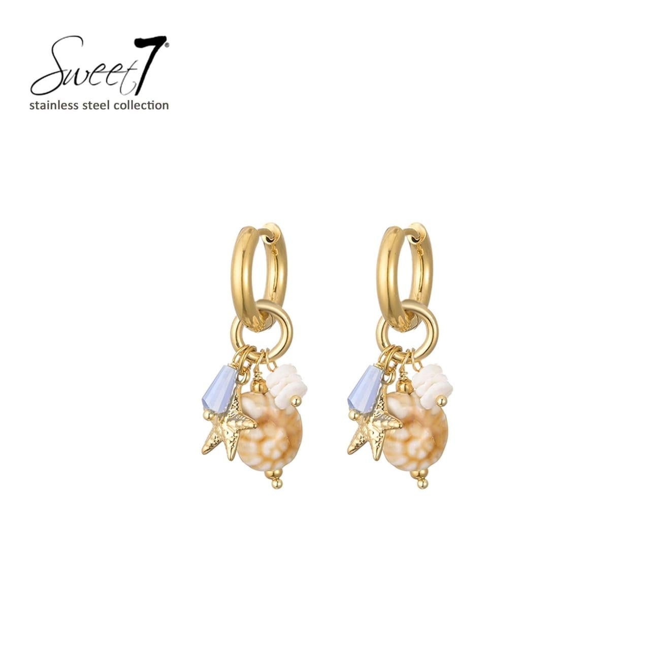 Oorbellen met zomerse bedels en speelse kralen combinatie