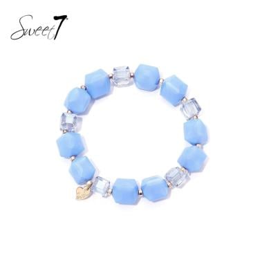 Armband met zachtblauwe en transparante kralen