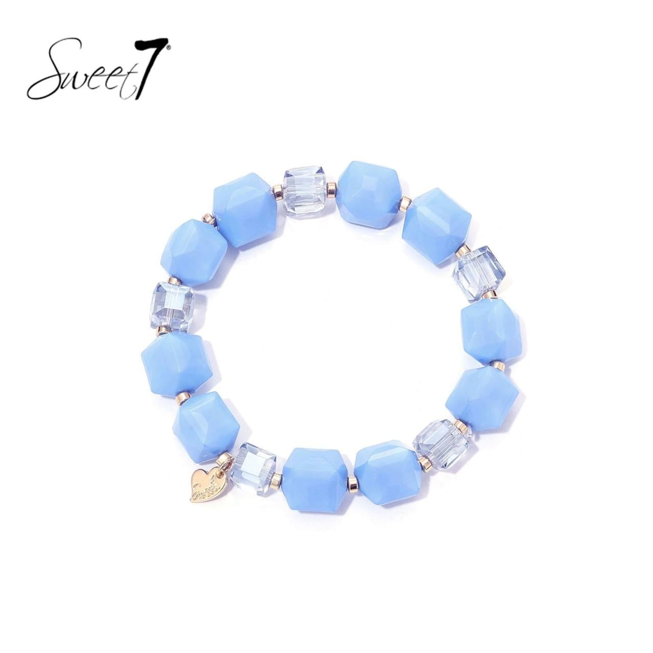 Armband met zachtblauwe en transparante kralen