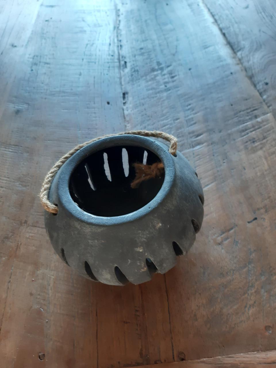 Waxinelichthouder gee koeriersdiensten