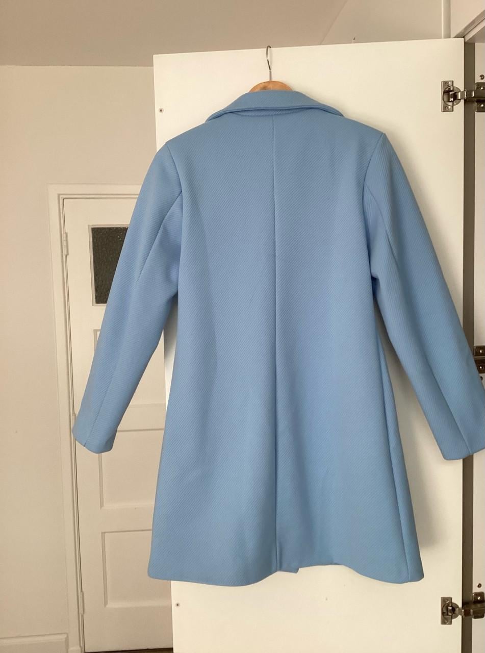 Prachtige licht blauwe jas amper gedragen maat M tussenjas