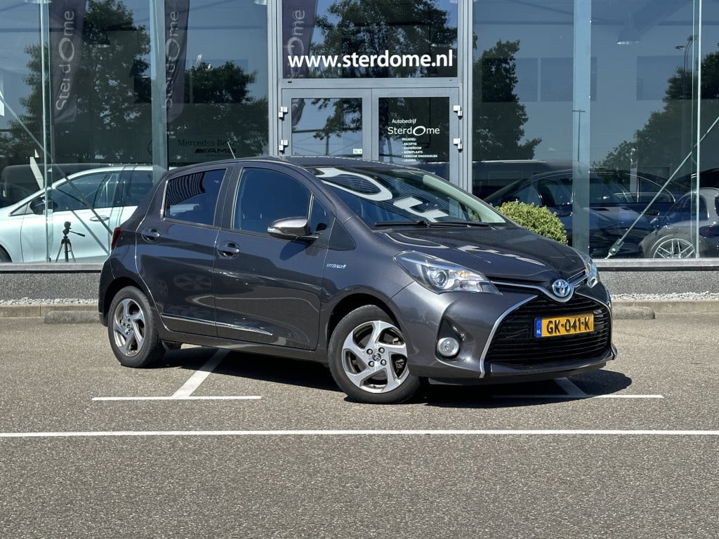 Toyota Yaris 1.5 hybrid lease i camera i automaat i airco l navigatie i zee