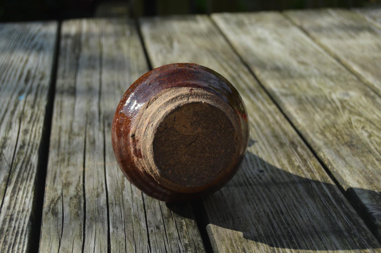 Klein aardewerk schenkflesje verm. 18e/19e eeuws.