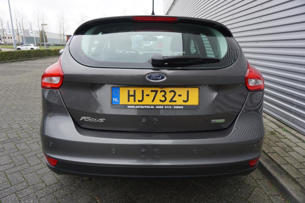 Ford Focus 1.0 titanium edition 1e eigenaar / navi / climate controle / cru