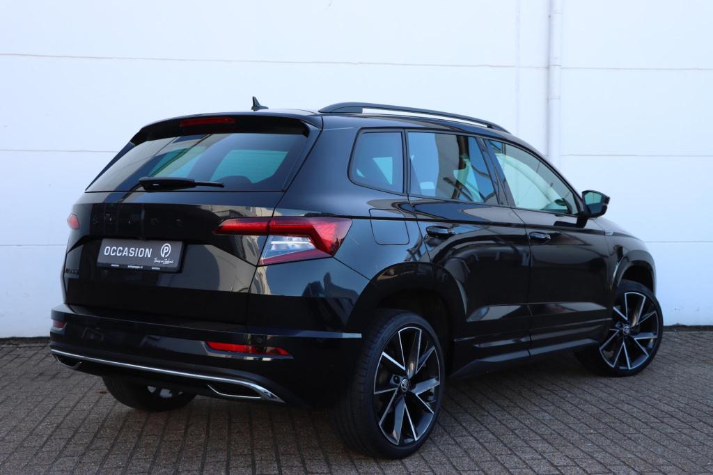 Skoda Karoq 1.5 tsi 150pk dsg7 sportline business trekhaak | camera | carpl