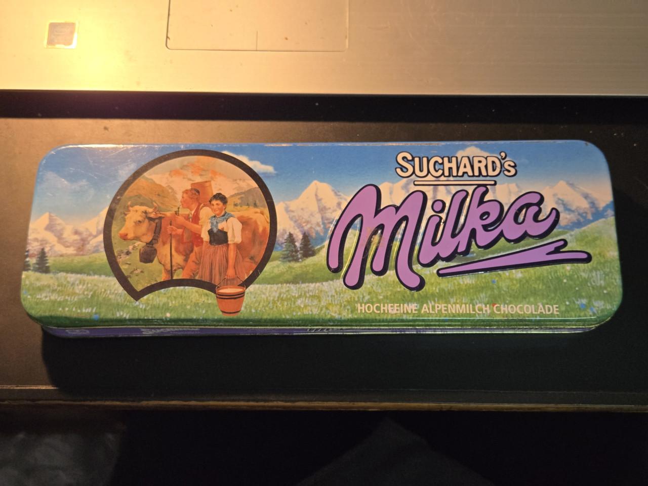 Suchard's Milka Hochfeine Alpenmilch Chocolade verzamelblik.