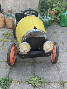 Vintage metalen trapauto