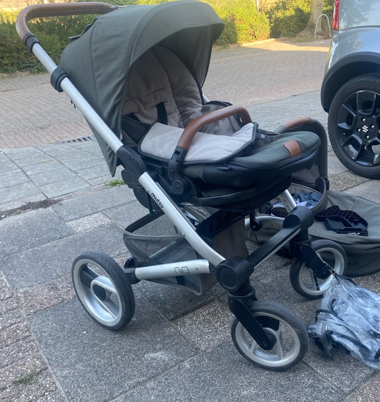 Kinderwagen + reiswieg en extra’s